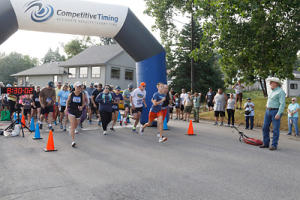 Runners start their race as Craig Johnson fires the starters pistol.