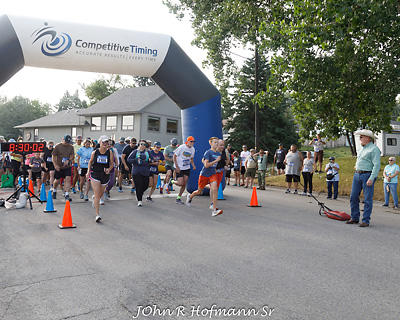 Runners start their race as Craig Johnson fires the starters pistol.